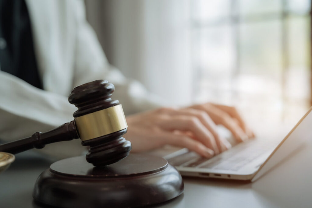 lawyer and gavel on table